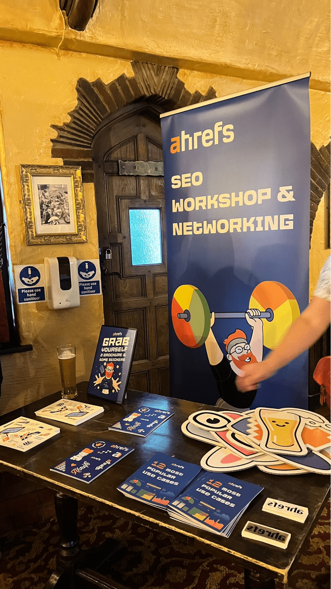 Dear BrightonSEO, You've Come a Long Way, Baby | Banner and swag at the Ahrefs workshop