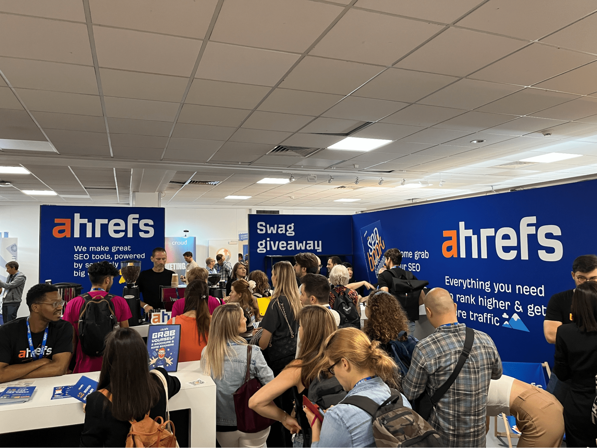 Dear BrightonSEO, You've Come a Long Way, Baby | Busy crowds at Ahrefs' exhibitor stand