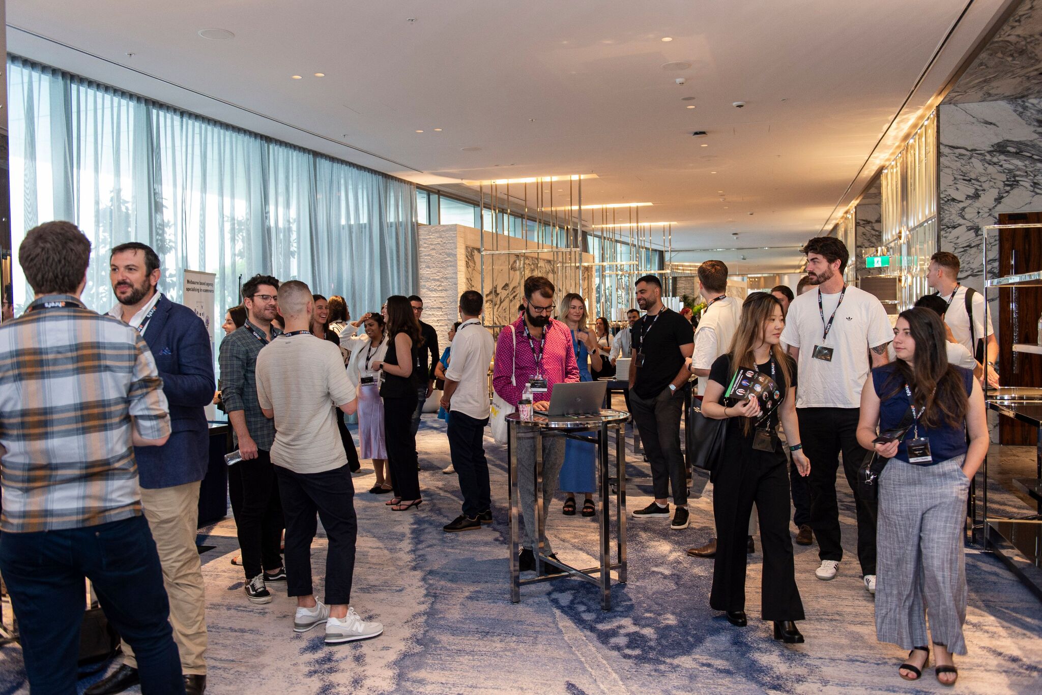 Sydney SEO Conference: “An Absolute Belter” | Photo of guests mingling during the breaks in the hotel's waiting area.