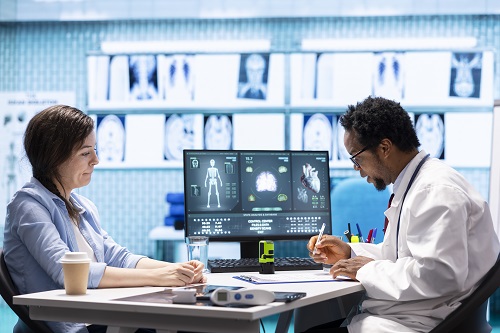 Professional medic prescribing antibiotics and supplements for a sick patient